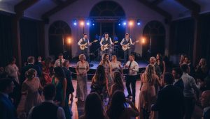 57 Best Wedding Reception Songs for a Live Band in 2026: The Ultimate Setlist